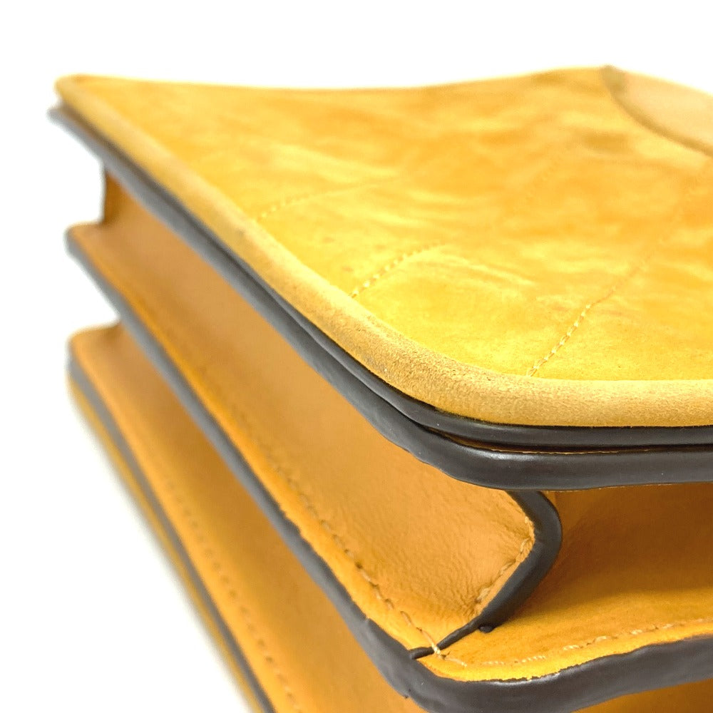 Tory Burch logo chain shoulder bag in lambskin, yellow.
