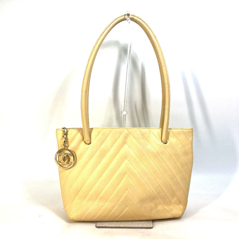 CHANEL CC Coco Mark V-Stitch Chevron Shoulder Tote Bag in Caviar Leather, Yellow