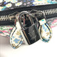 LOUIS VUITTON Floral Print Tupi Shoulder Bag in Black Leather, Unisex