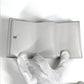 LOUIS VUITTON M67621 Taiga Rama Discovery Compact Wallet, a tri-fold wallet in Taiga leather, unisex, in blanc and white.