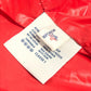 MONCLER Hever Gilet Hever Vest, a sleeveless down vest with a hood, available in red.