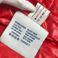 MONCLER Hever Gilet Hever Vest, a sleeveless down vest with a hood, available in red.