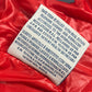 MONCLER Hever Gilet Hever Vest, a sleeveless down vest with a hood, available in red.