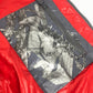 MONCLER Hever Gilet Hever Vest, a sleeveless down vest with a hood, available in red.