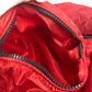 MONCLER Hever Gilet Hever Vest, a sleeveless down vest with a hood, available in red.