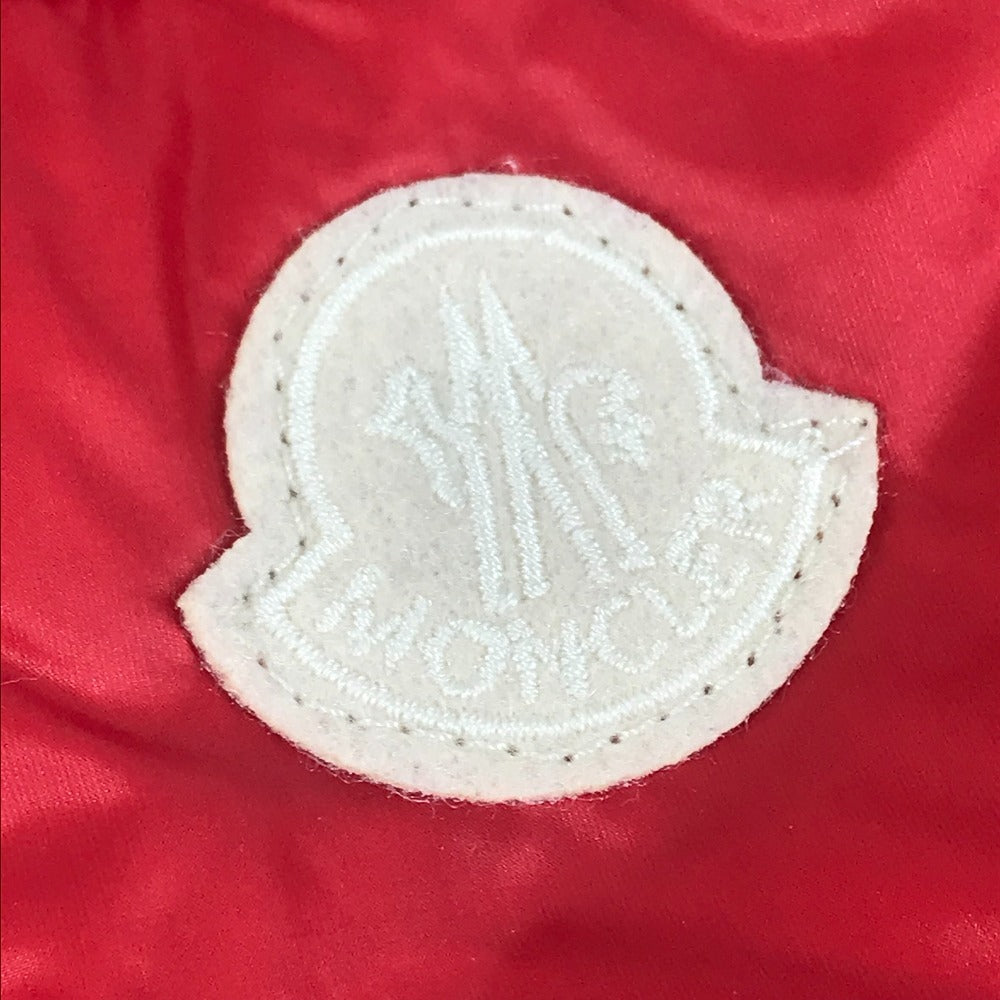 MONCLER Hever Gilet Hever Vest, a sleeveless down vest with a hood, available in red.