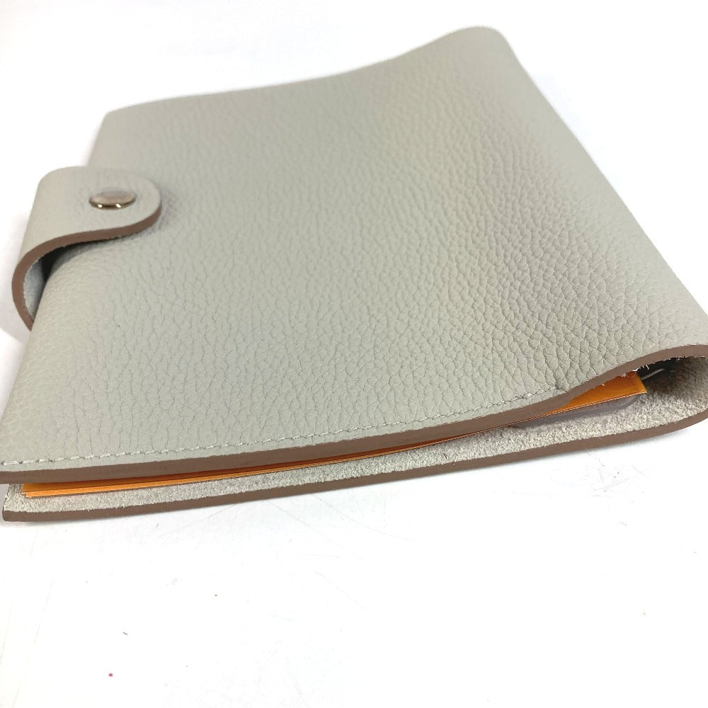 HERMES ปกสมุดบันทึก Ulysse Neo PM สมุดบันทึก Ulysse Neo PM เครื่องเขียน ออร์แกไนเซอร์ กล่องใส่สมุดจด ปกสมุดจดหนัง ยูนิเซ็กส์ สีเทาอ่อน