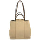HERMES Cabag PM, a handbag/shoulder bag in brown leather/canvas.