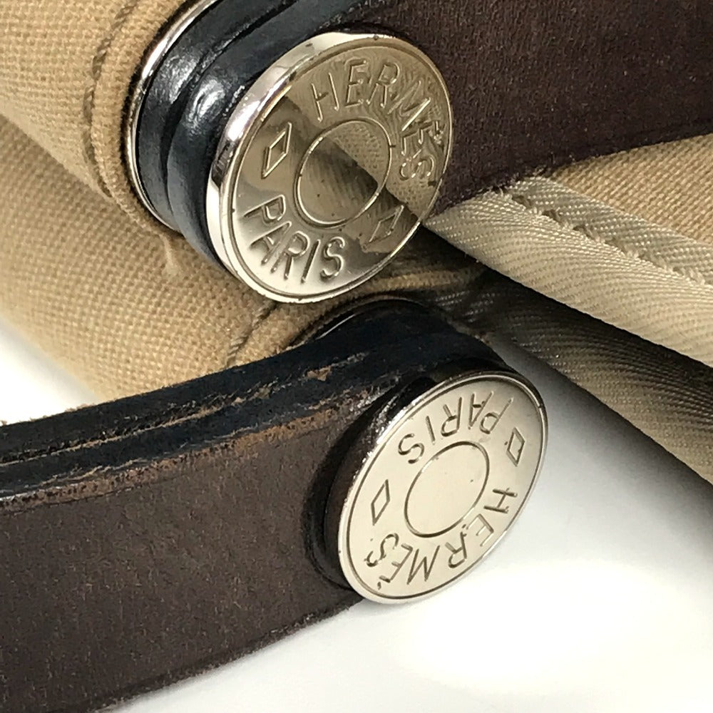HERMES Cabag PM, a handbag/shoulder bag in brown leather/canvas.