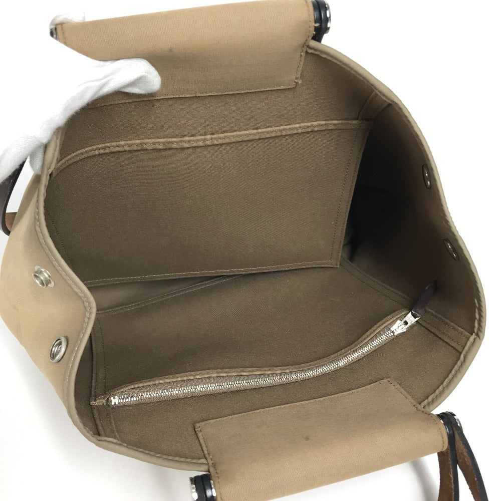 HERMES Cabag PM, a handbag/shoulder bag in brown leather/canvas.