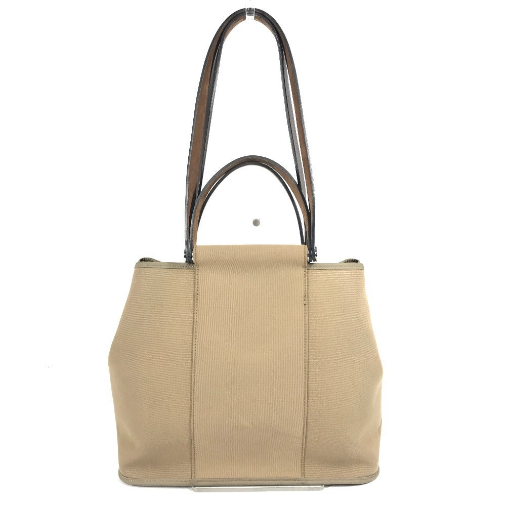 HERMES Cabag PM, a handbag/shoulder bag in brown leather/canvas.