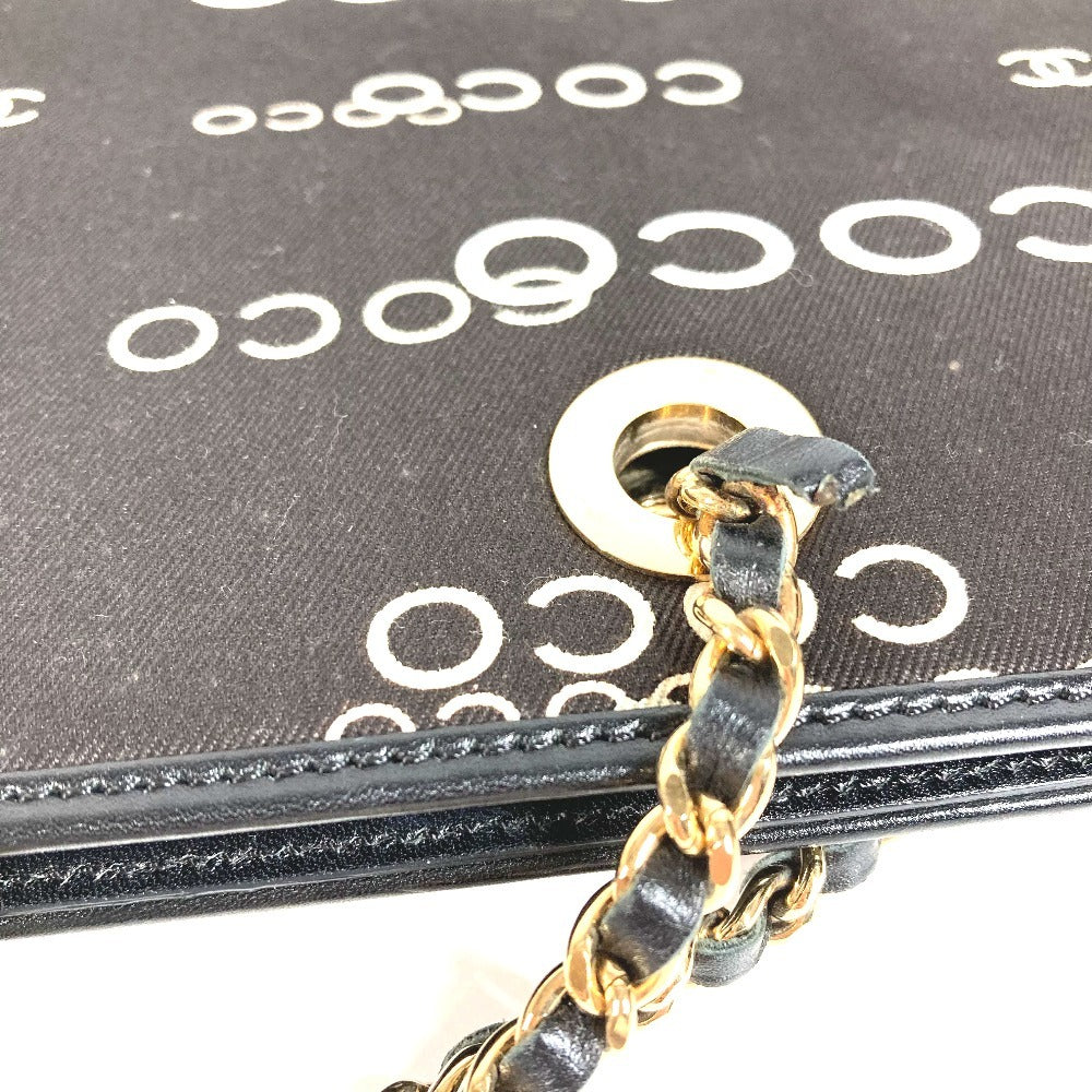 CHANEL วินเทจ CC โคโค่มาร์ค โลโก้ กระเป๋าถือทรงแฟลต กระเป๋าสะพายโซ่ กระเป๋าสะพายไหล่ กระเป๋าโท้ท โซ่คู่ กระเป๋าสะพายหนัง/แคนวาส ยูนิเซ็กส์ สีดำ
