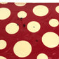 LOUIS VUITTON M91572 Vernis Dot Infinity Zippy Wallet, a collaboration with Yayoi Kusama. This long wallet is made of patent leather and is available in red.