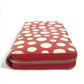 LOUIS VUITTON M91572 Vernis Dot Infinity Zippy Wallet, a collaboration with Yayoi Kusama. This long wallet is made of patent leather and is available in red.