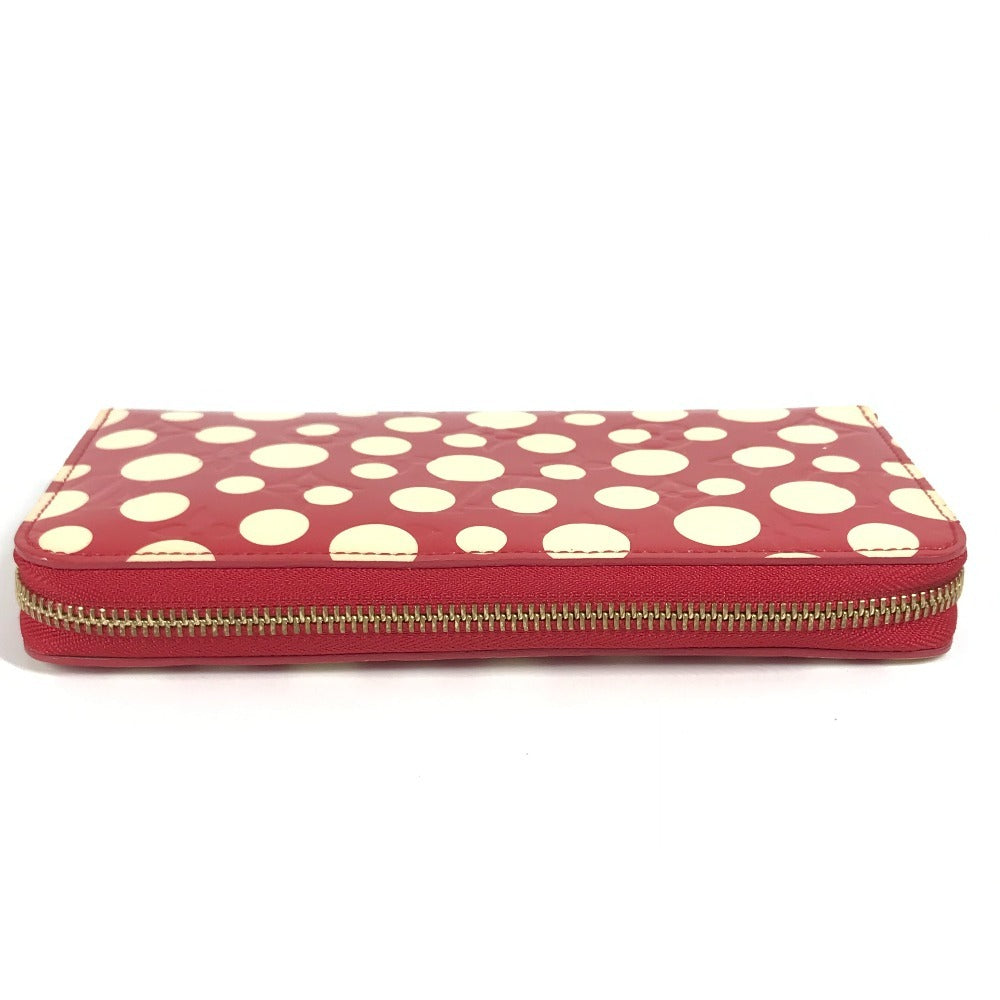 LOUIS VUITTON M91572 Vernis Dot Infinity Zippy Wallet, a collaboration with Yayoi Kusama. This long wallet is made of patent leather and is available in red.