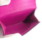 LOUIS VUITTON M30773 Taiga Rama Discovery Compact Wallet, a tri-fold wallet in Taiga leather, unisex, pink.