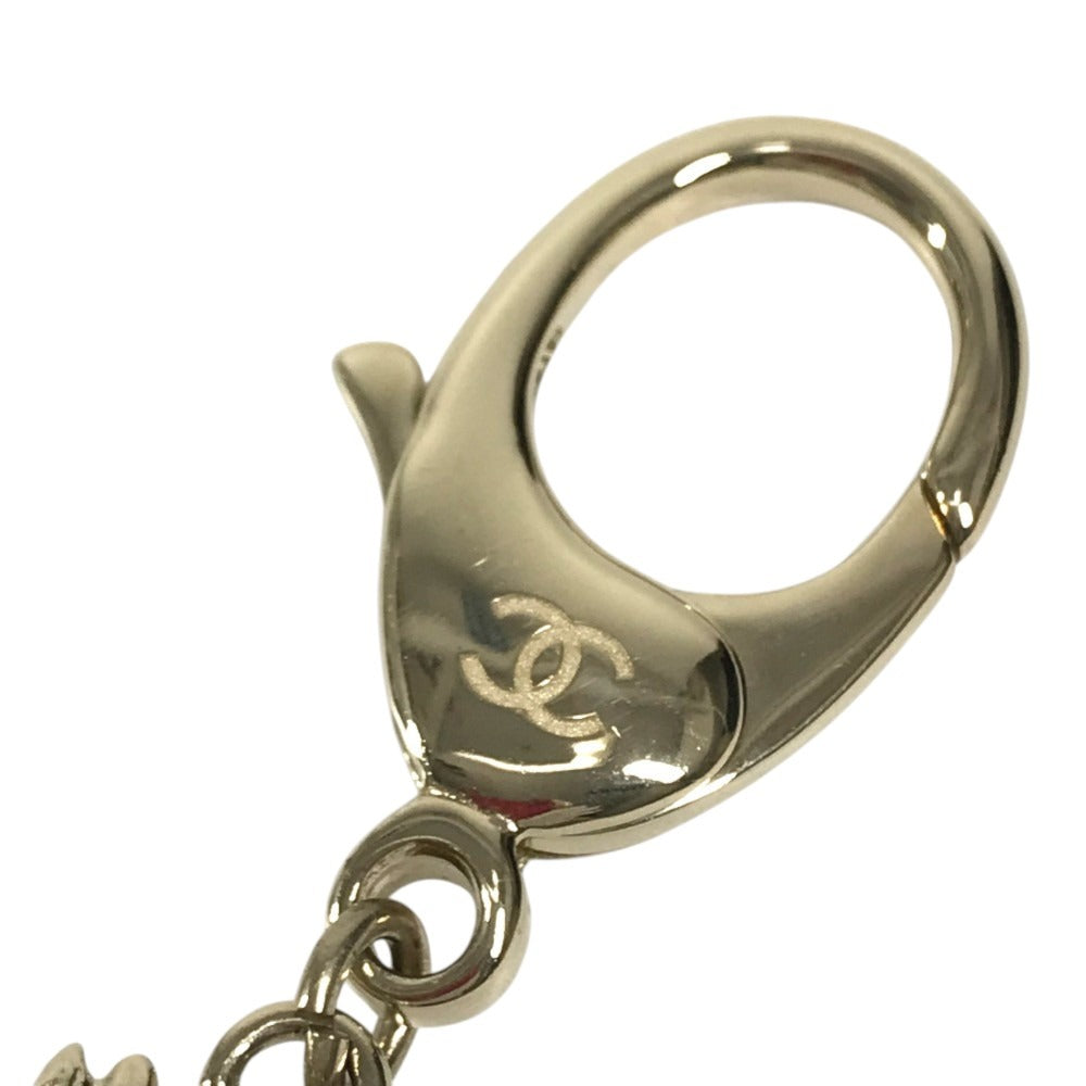 CHANEL 22P Lion Camellia Logo Animal Rhinestone Charm Bag Charm Key Holder Metal Black/Gold Used
